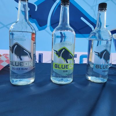 Bottles of Blue Ox spritis on a talbe